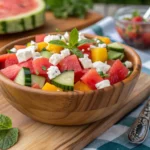 Fresh and colorful summer salad recipe with seasonal fruits, crisp vegetables, and light dressing, perfect for hot weather meals